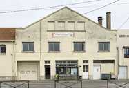 coopérative agricole de la Haute-Saône, puis imprimerie Marcel Bon (IMB), actuellement entrepôt commercial